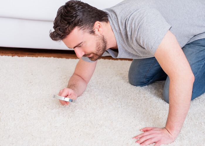 Man Checking For Mites